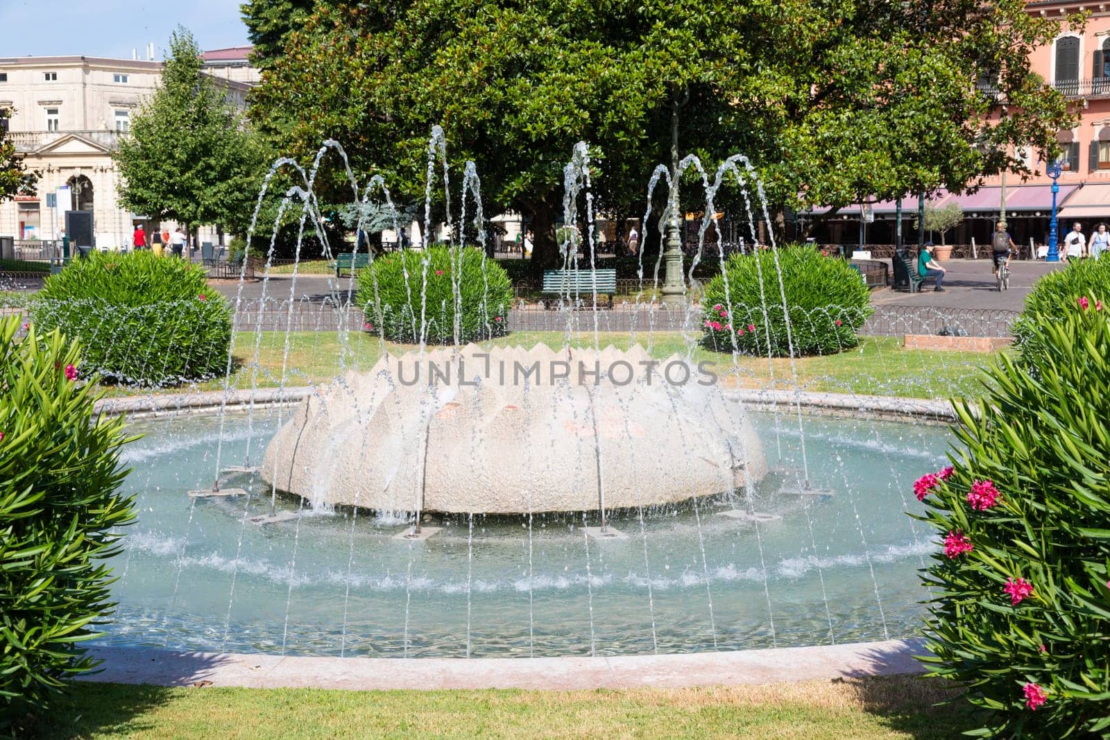 Verona, Italy - June 2022: the Fountain of Alps, located in Piazza Bra garden