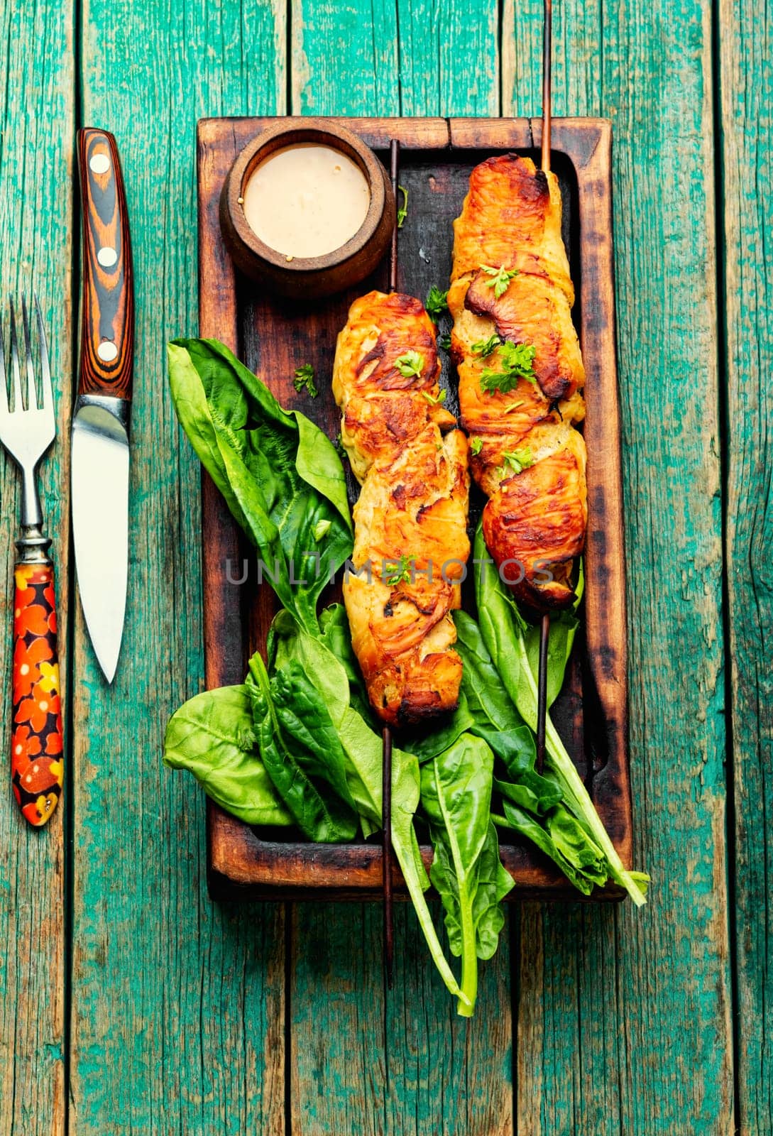 Tasty chicken meat, chicken breast roasted on wooden skewers. Kebabs