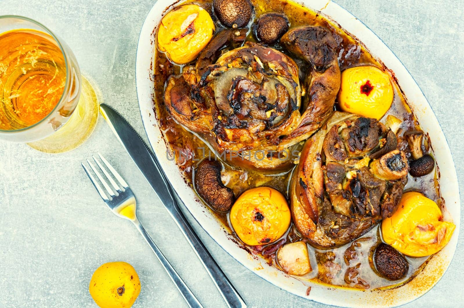 Roasted pork knuckle eisbein with cabbage and apples. Pork leg, German food