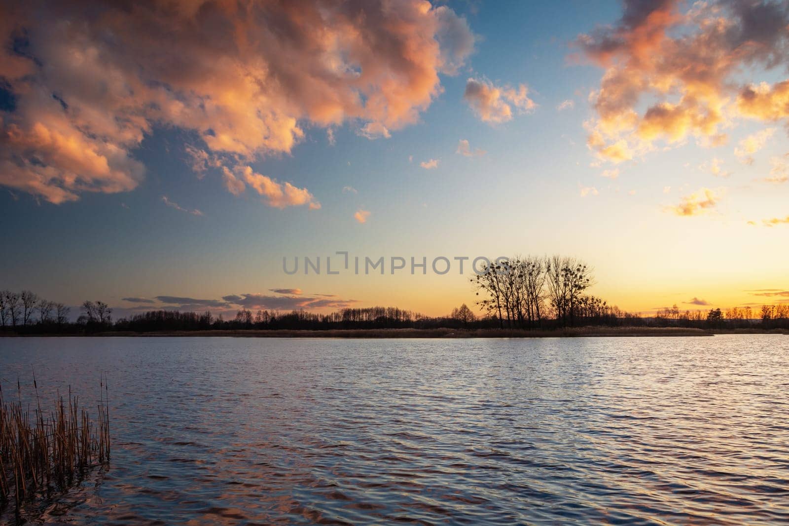 Colourful clouds after the sunset over the lake, Stankow, Poland