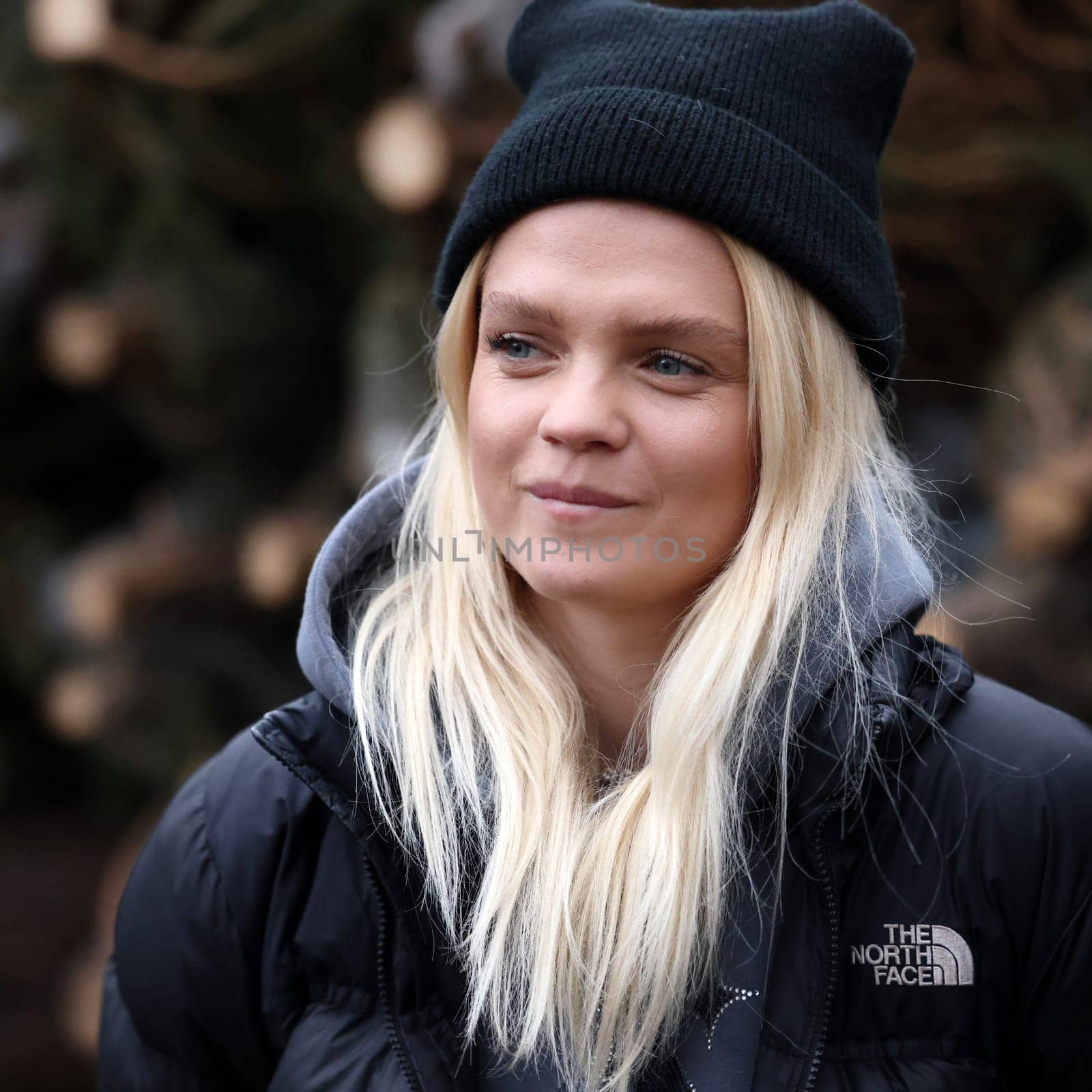 Krakow, Poland - Dec 19, 2021: Margaret during the distribution of Christmas trees at Szczepanski Square in Krakow