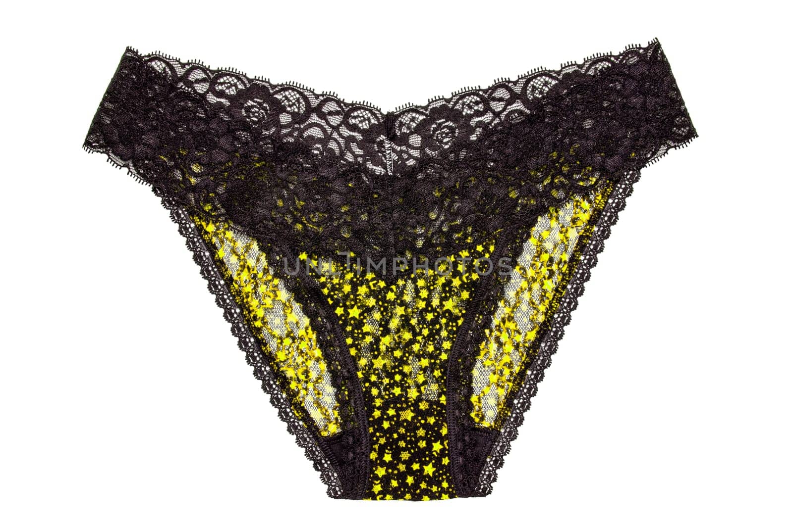 Underwear woman isolated. Close-up of luxurious elegant black lacy thongs panties with colorful yellow stars pattern isolated. Clipping path. Macro. Underwear fashion.