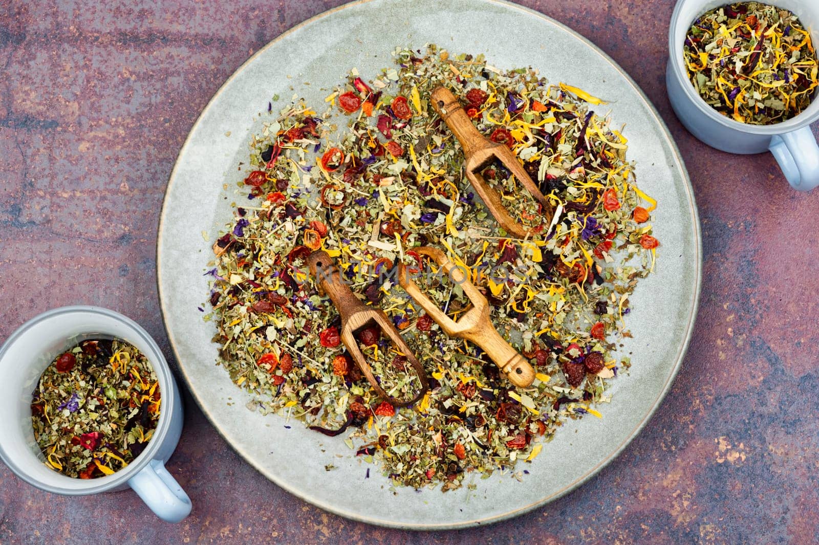 Herbal tea with healthy herbs in scoop. Natural herbal medicine. Flat lay