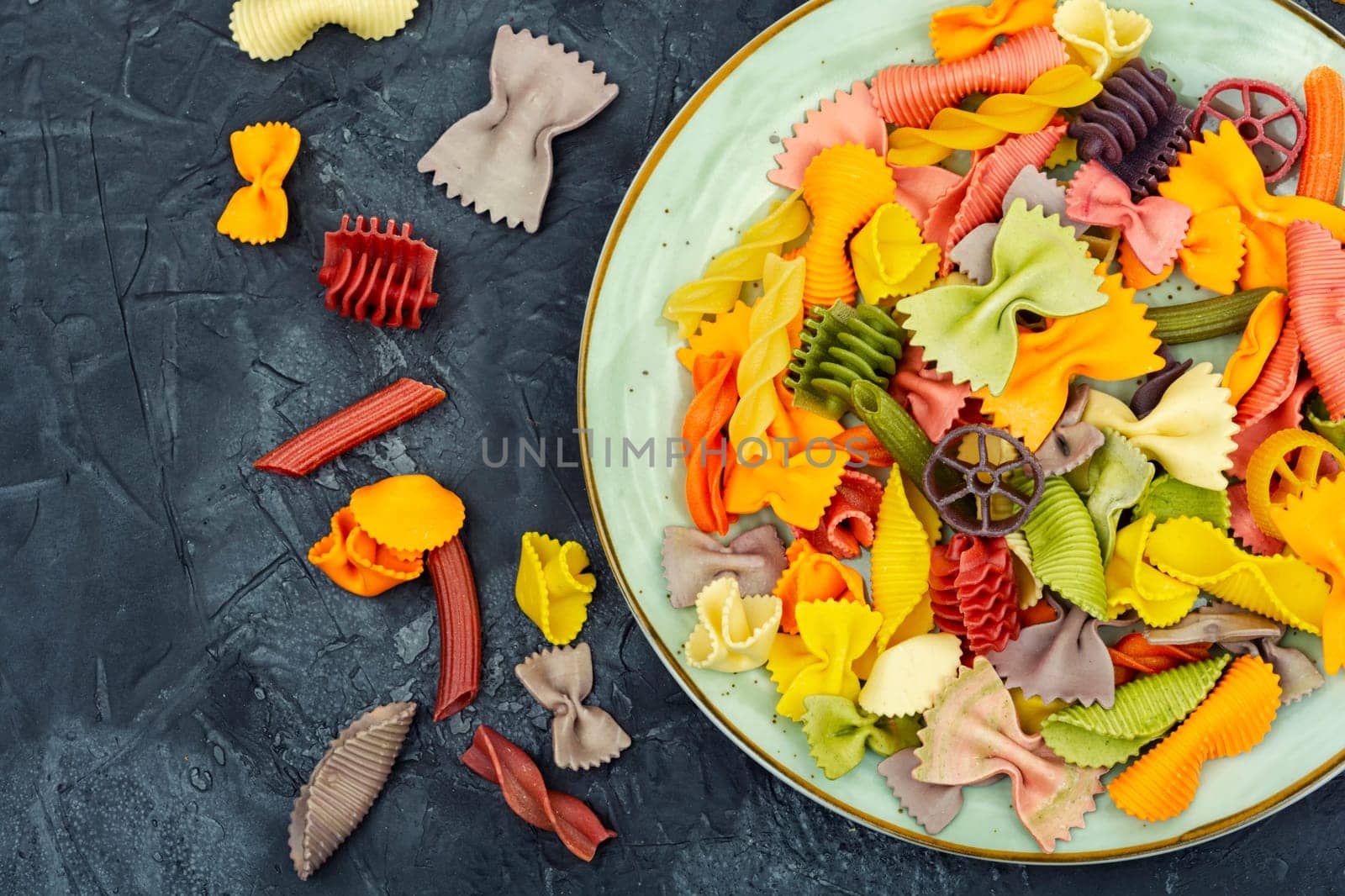 Colorful Italian pasta. Various colors of pasta. Texture background