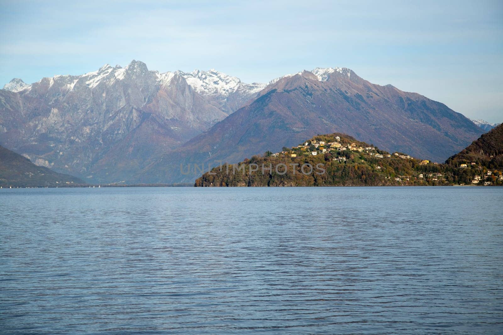 Lake landscape with mountains on the background, horizontal view