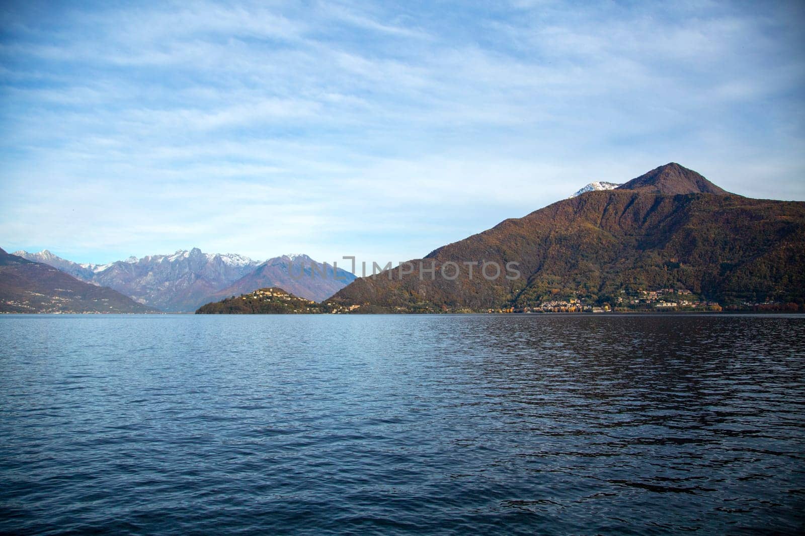 Lake landscape with mountains on the background, horizontal view