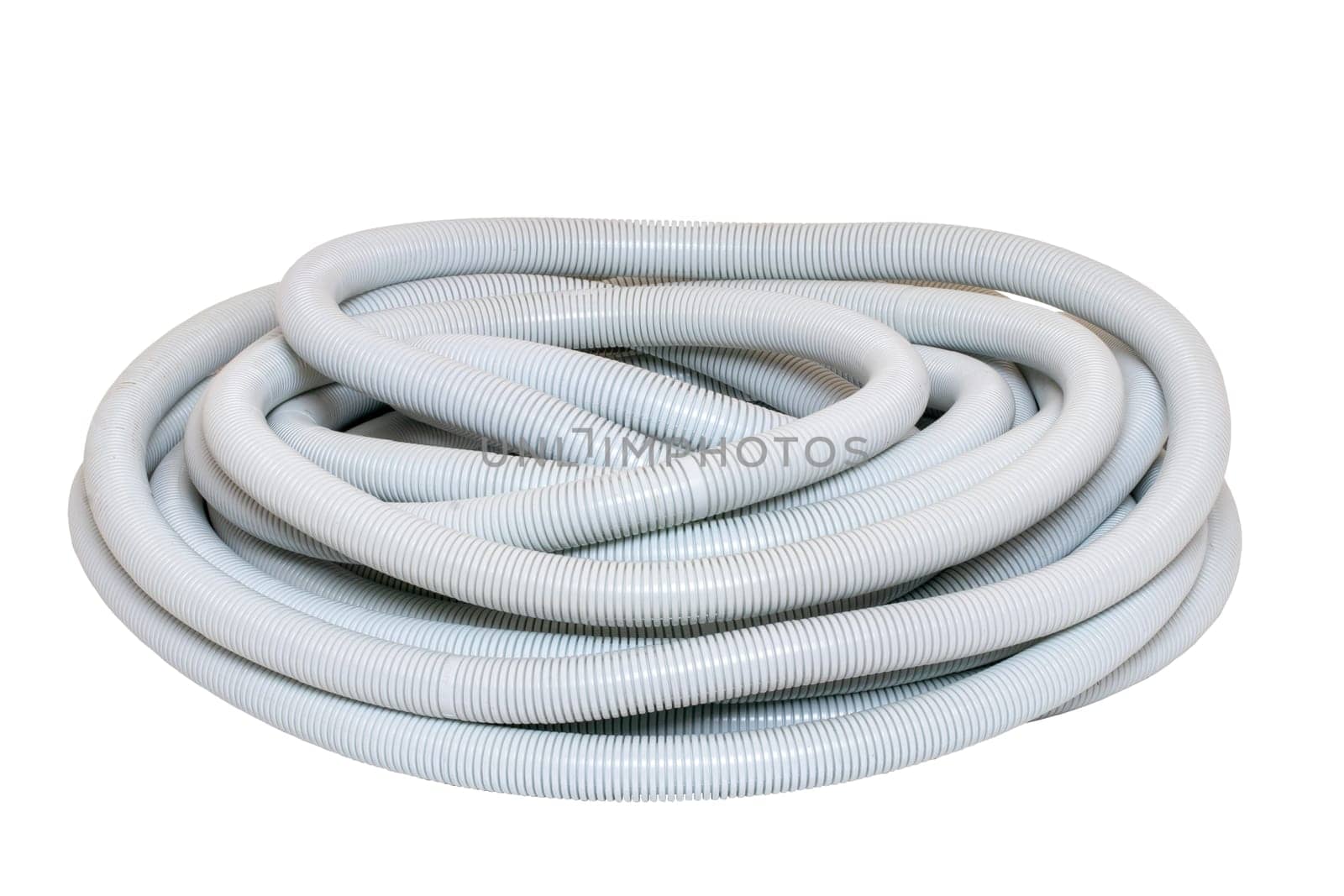Gray industrial flexible corrugated pipe for installations of electric cable isolated on a white background. Hoses spool of flexible PVC. Macro.