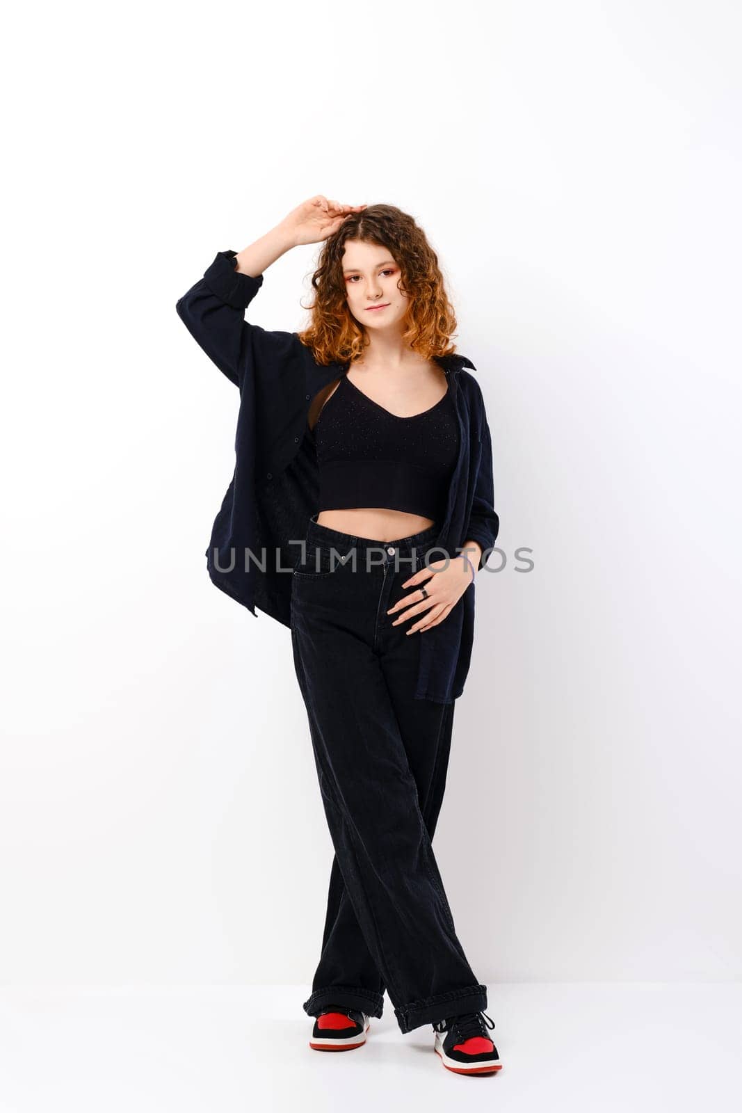 Lovely teenager girl in casual black clothes