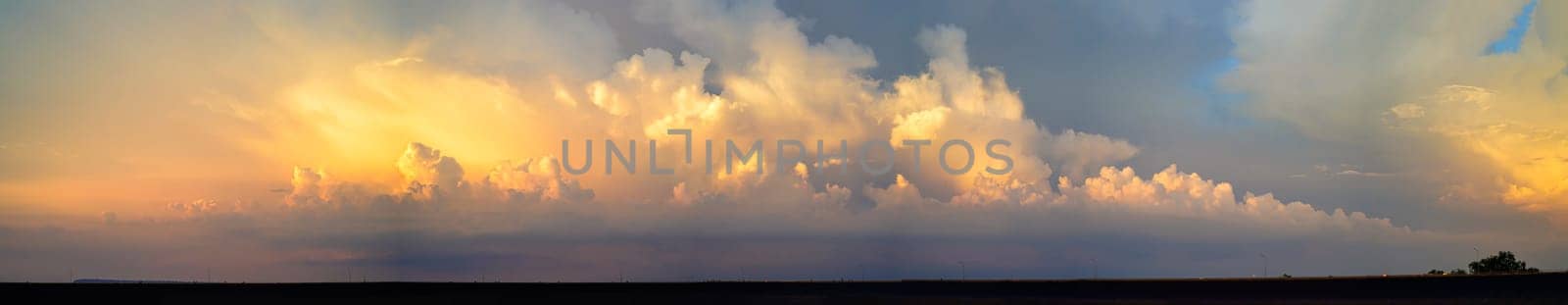 Panorama of Dramatic vibrant color with beautiful cloud of sunrise. Panoramic image
