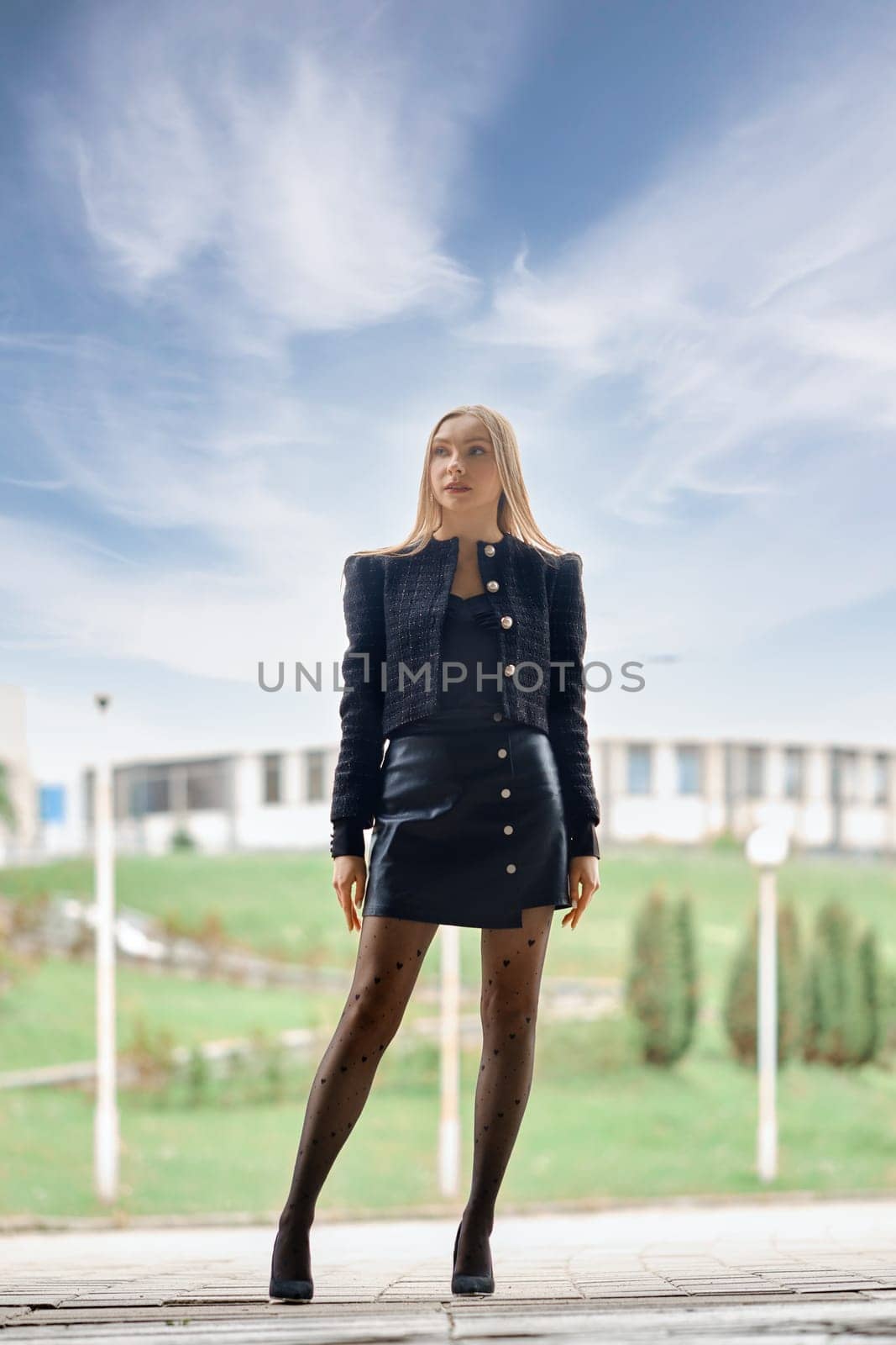 Full length urban portrait of confident woman outdoors