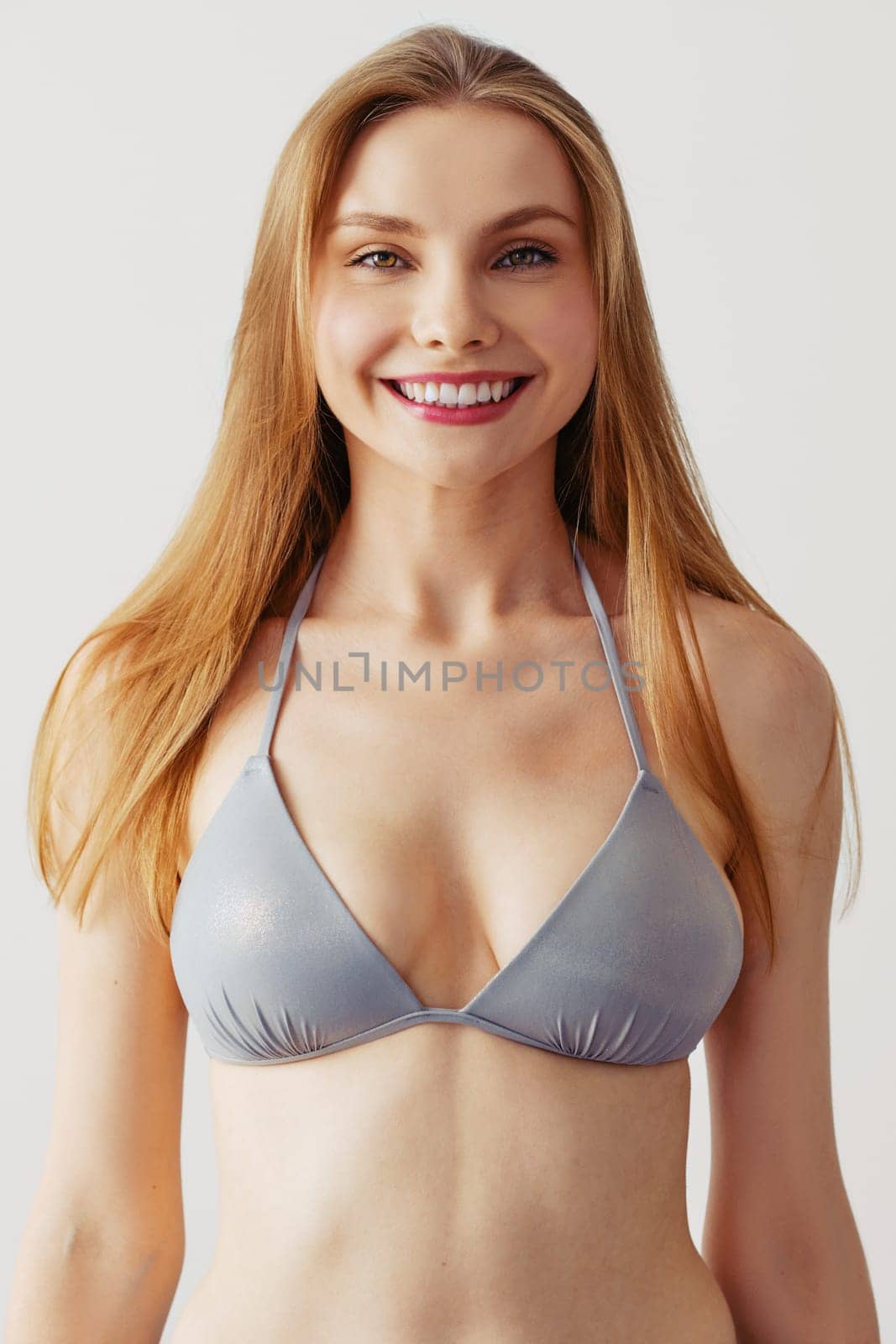Portrait of happy smiling woman in swimwear