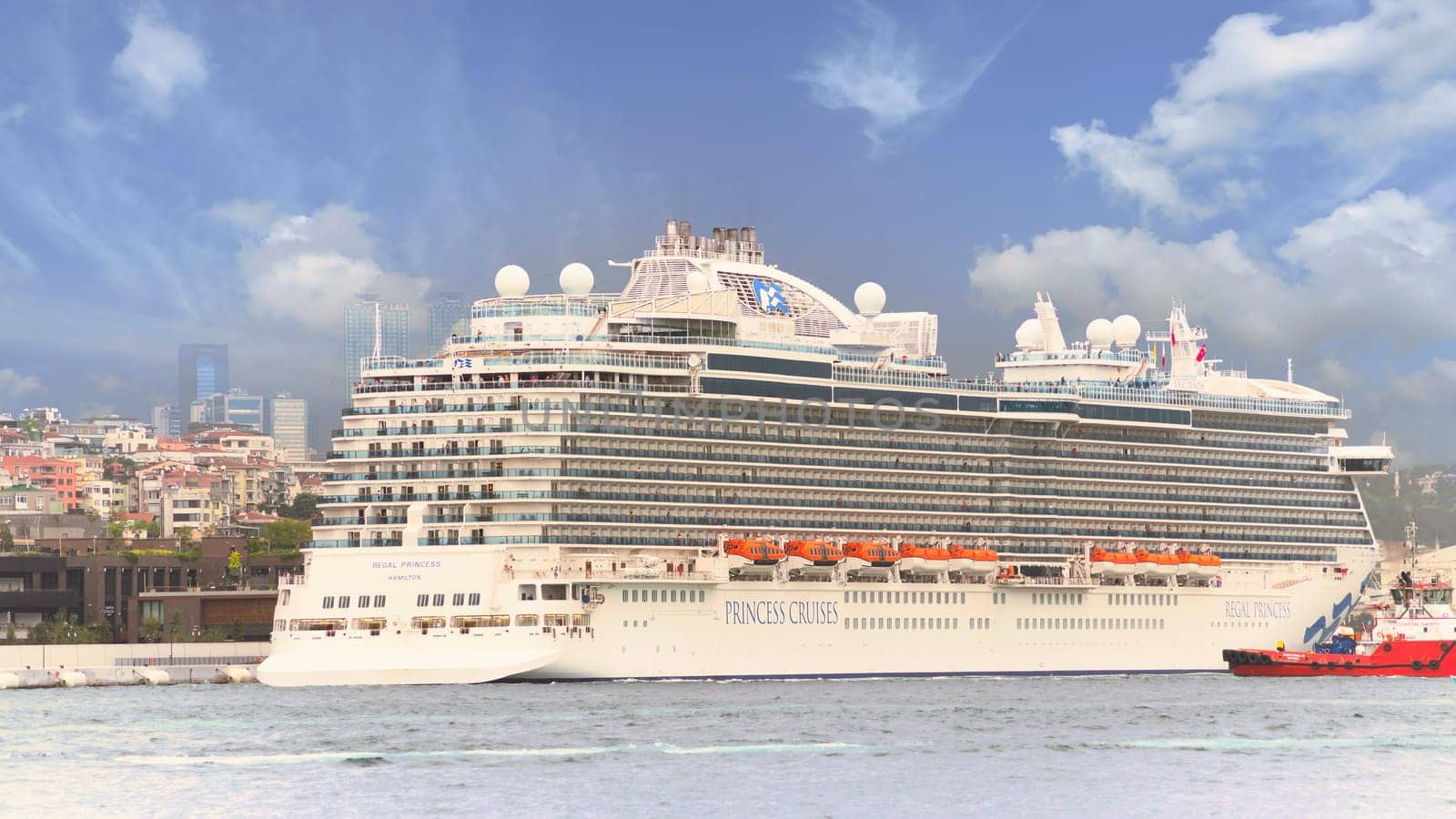 Istanbul, Turkey - August 25, 2022: Regal Princess, Huge cruise ship docked at terminal of Galataport, a mixed use development located along shore of Bosphorus strait, in Karakoy neighbourhood