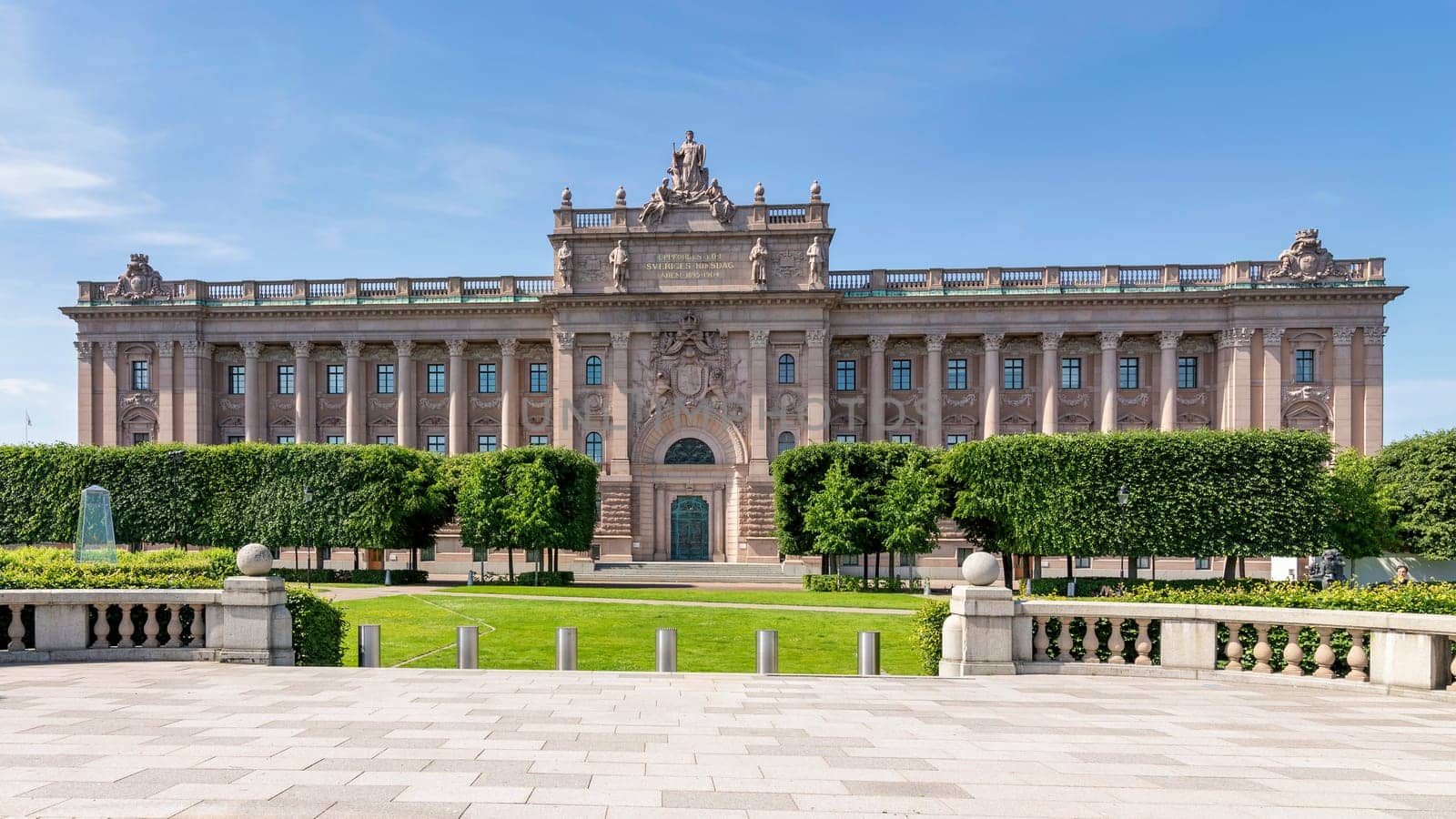 Facade of Riksdagshuset, the Swedish Parliament House, located on the island of Helgeandsholmen, Old town, or Gamla Stan, Stockholm, Sweden, in a summer day