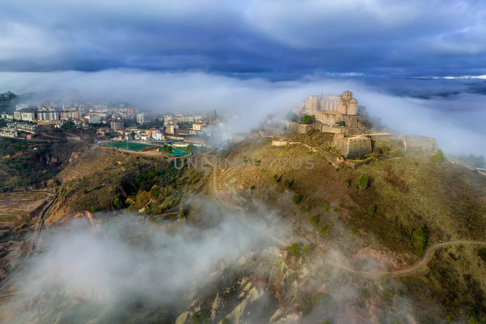 Cardona castle is a famous medieval castle in Catalonia. Between very dense fog that hides the city