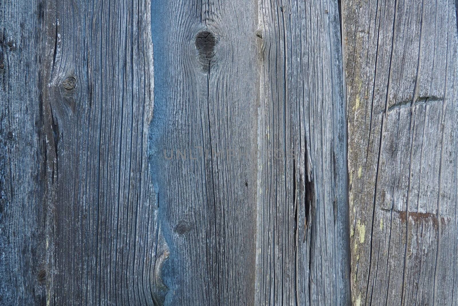 Vertical boards background. Gray brown old wood with knots. Board wall. Country style.