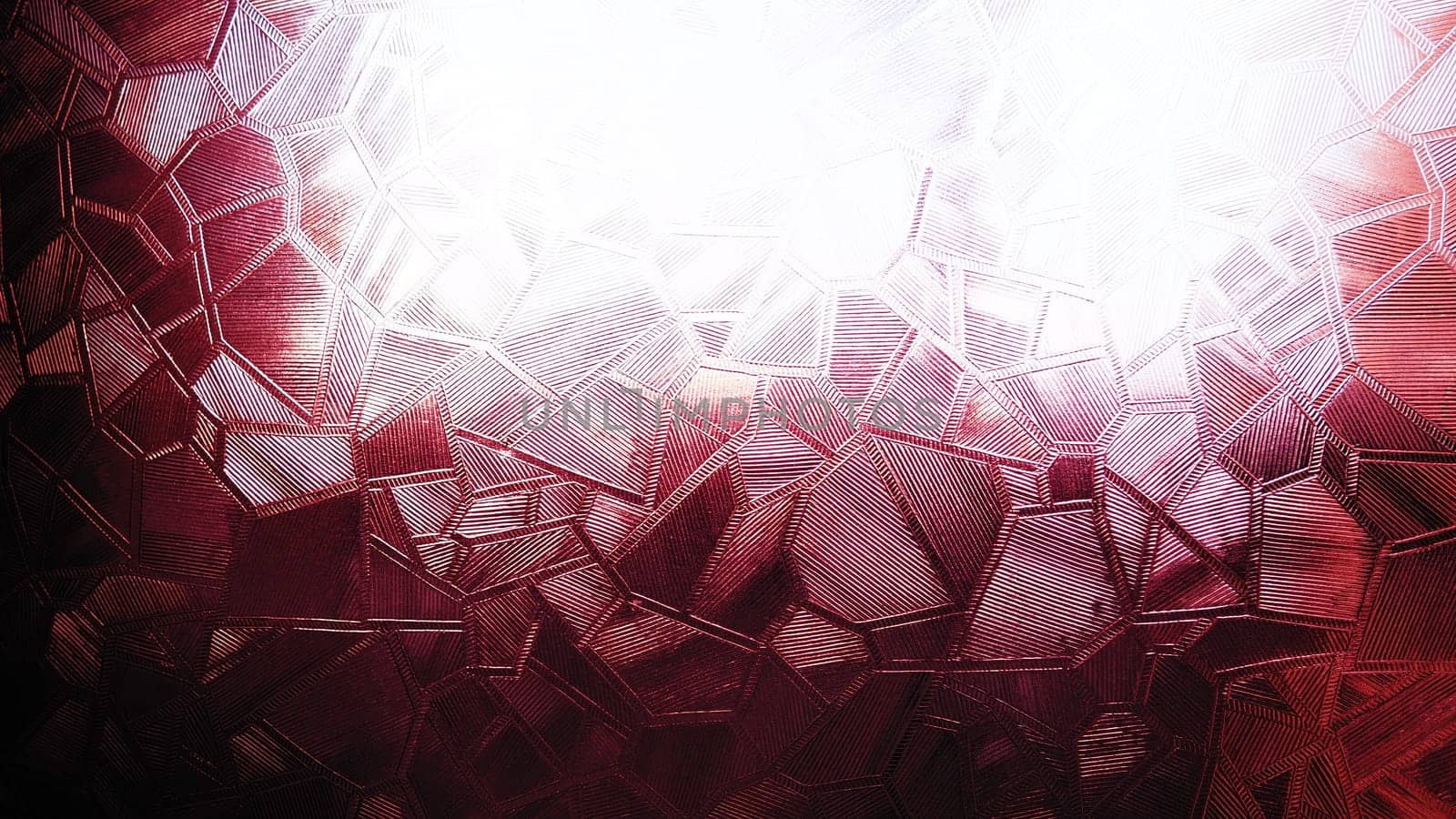 Embossed glass background. Corrugated glass pink monochrome. Refraction of light in a bumpy transparent surface under backlight. The play of highlights. Black red pink areas. Abstract background.