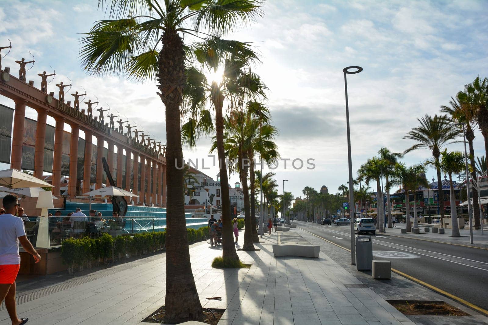 Hard Rock Cafe, Playa de la Americas, Tenerife, Spain August 12, 2022 - Building exterior with guitar, fountain and some archers stone figure, palm, on a street