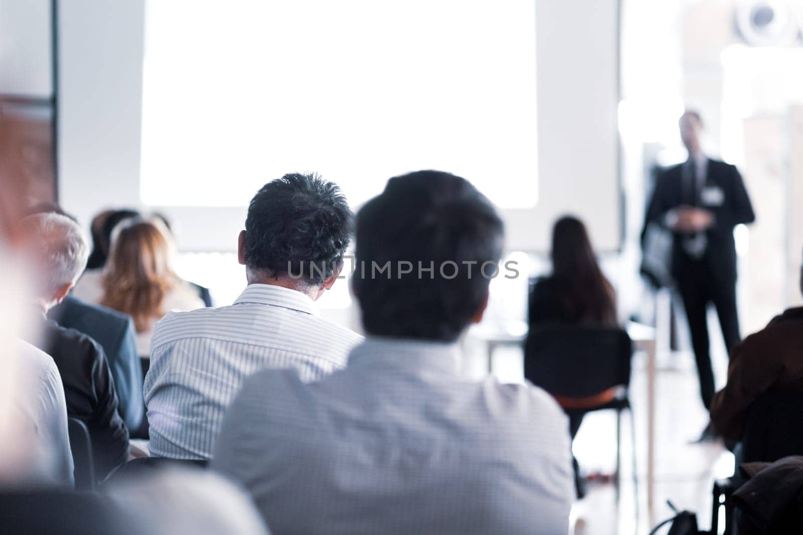 Speaker Giving a Talk at Business Meeting. Audience in the conference hall. Business and Entrepreneurship.