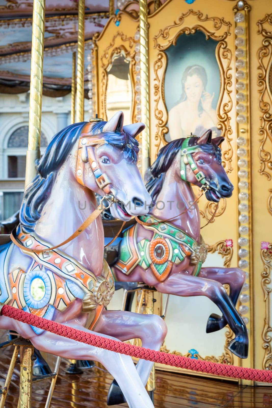 Florence, Italy - Circa March 2022: vintage carousel horse - antique attraction