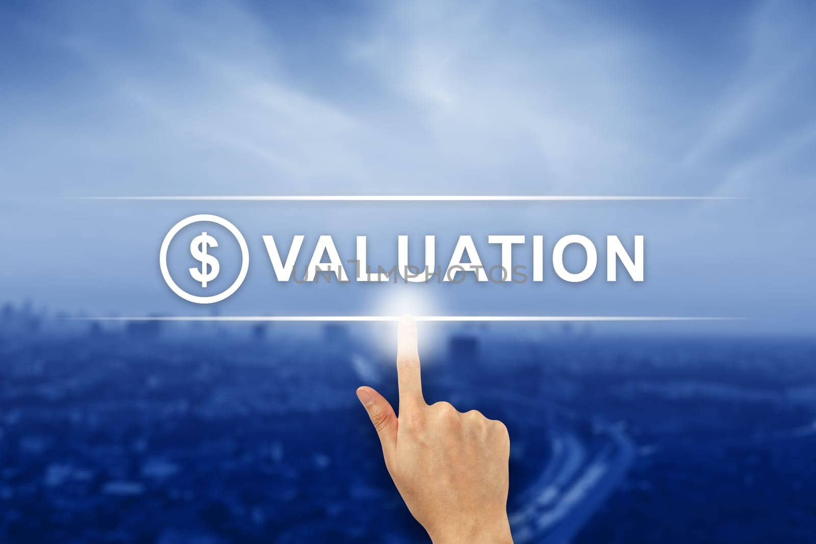 hand pushing financial valuation button on a virtual screen interface