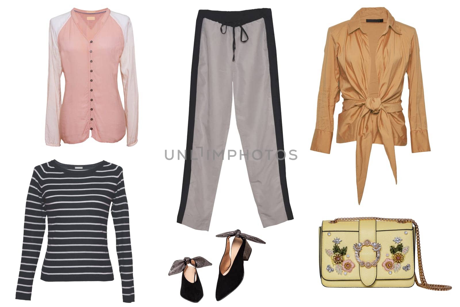 Collage woman clothes. Set of a stylish and trendy women blousescor shirts, a handbag, denim and jogging pants and other accessories isolated on a white background.