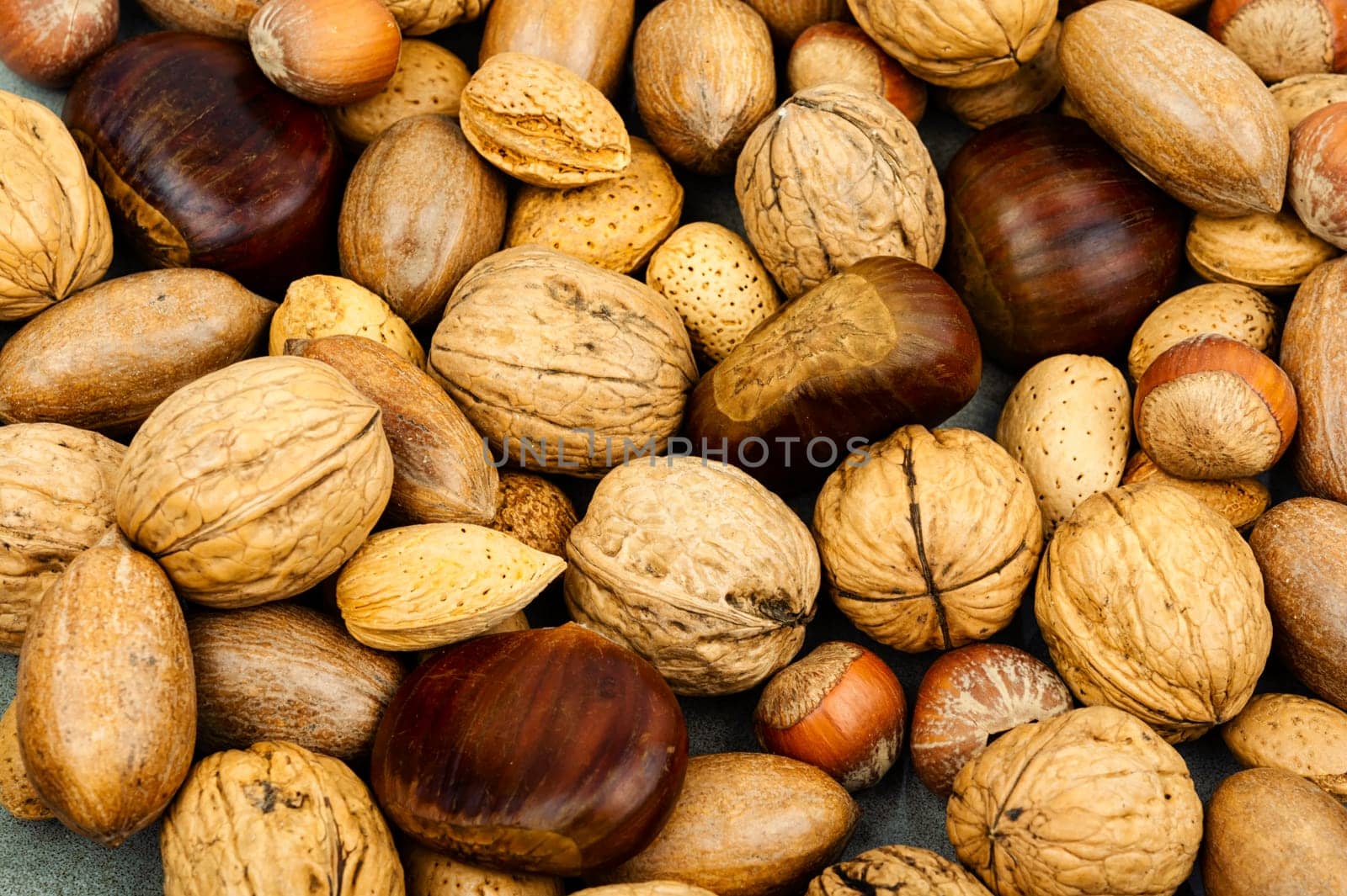 Walnut, chestnut, almond, hazelnut on the table.Healthy snacks Vegan food