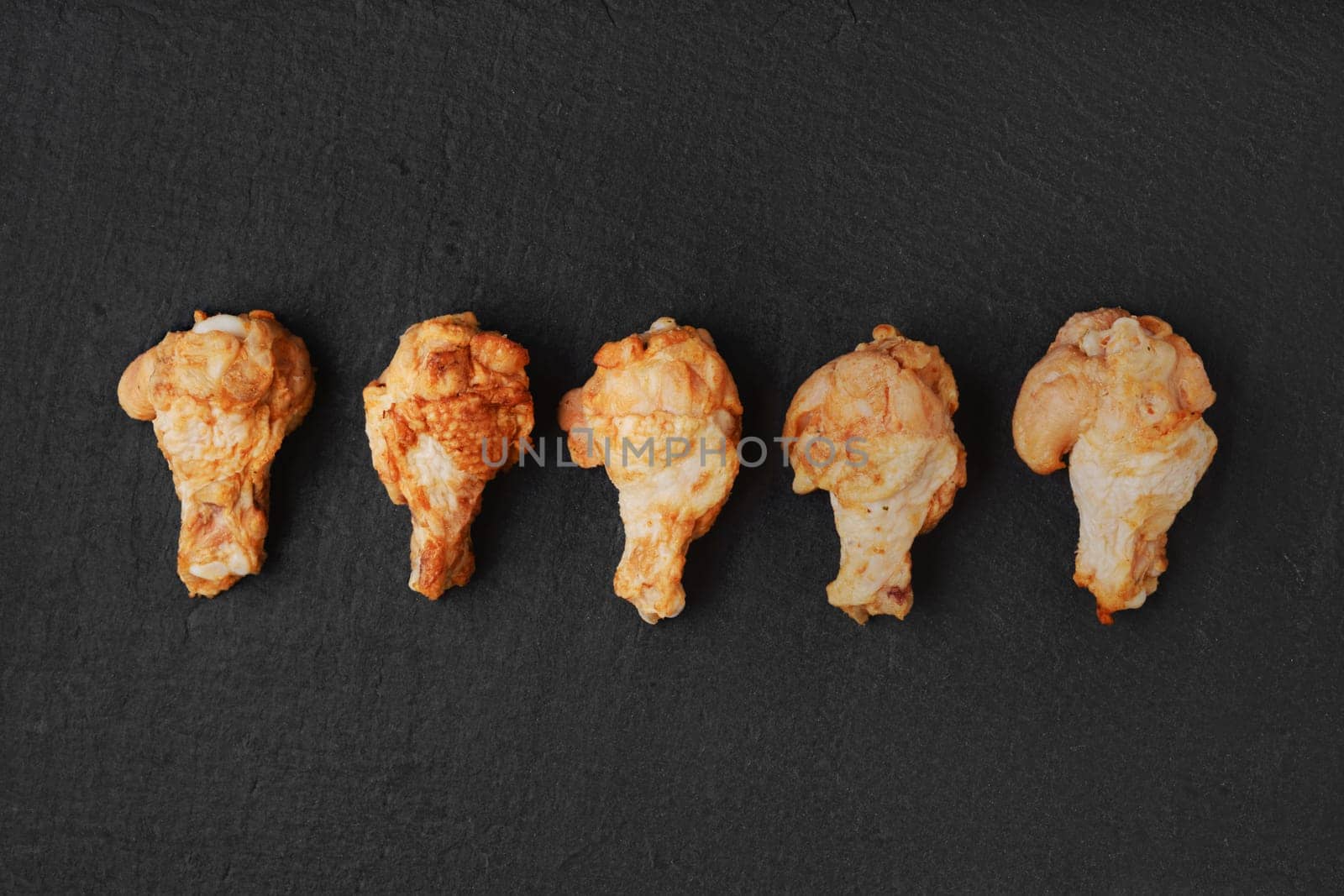Semifinished frozen chicken meat ready for deep frying