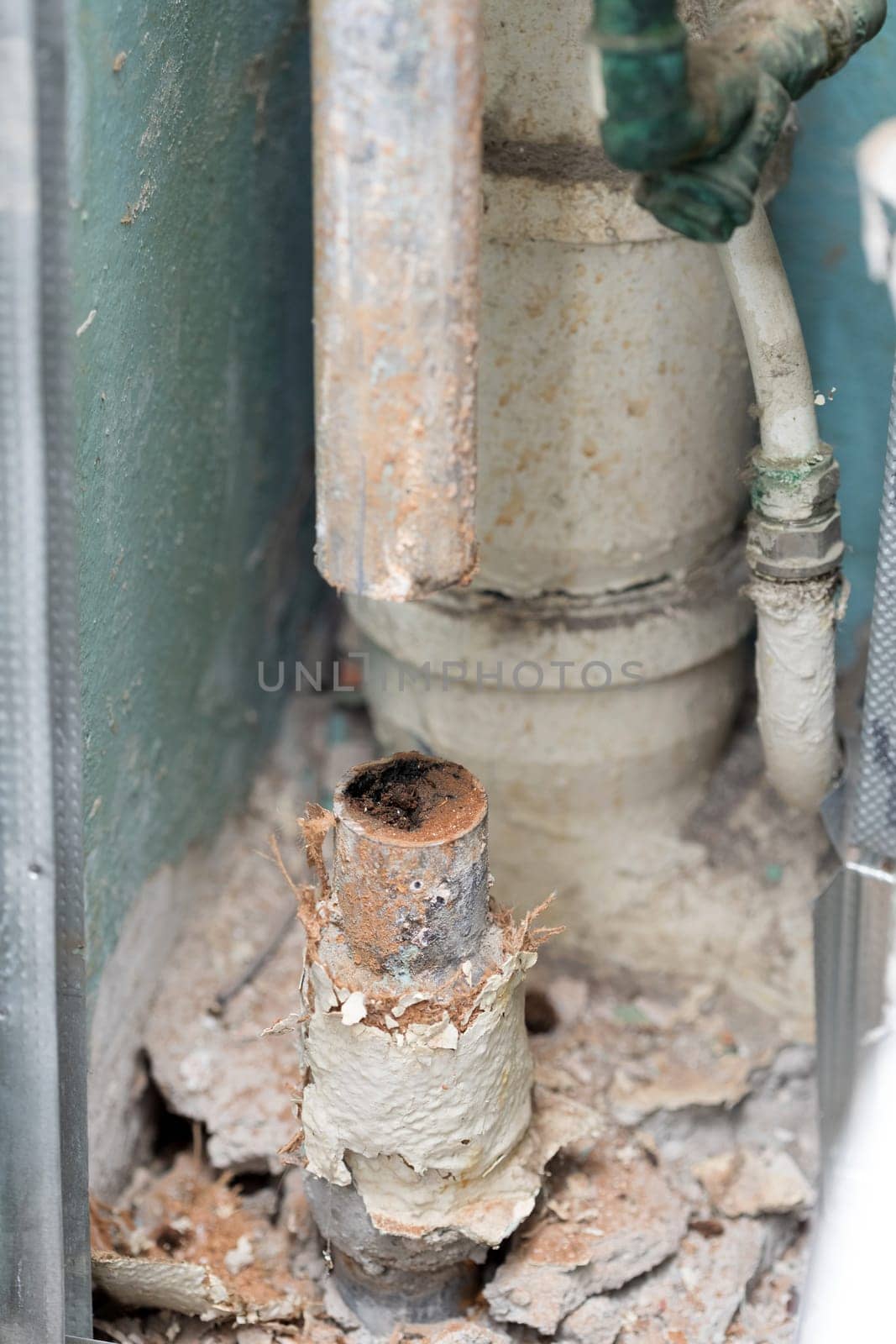 Old water pipe line clogged with rust