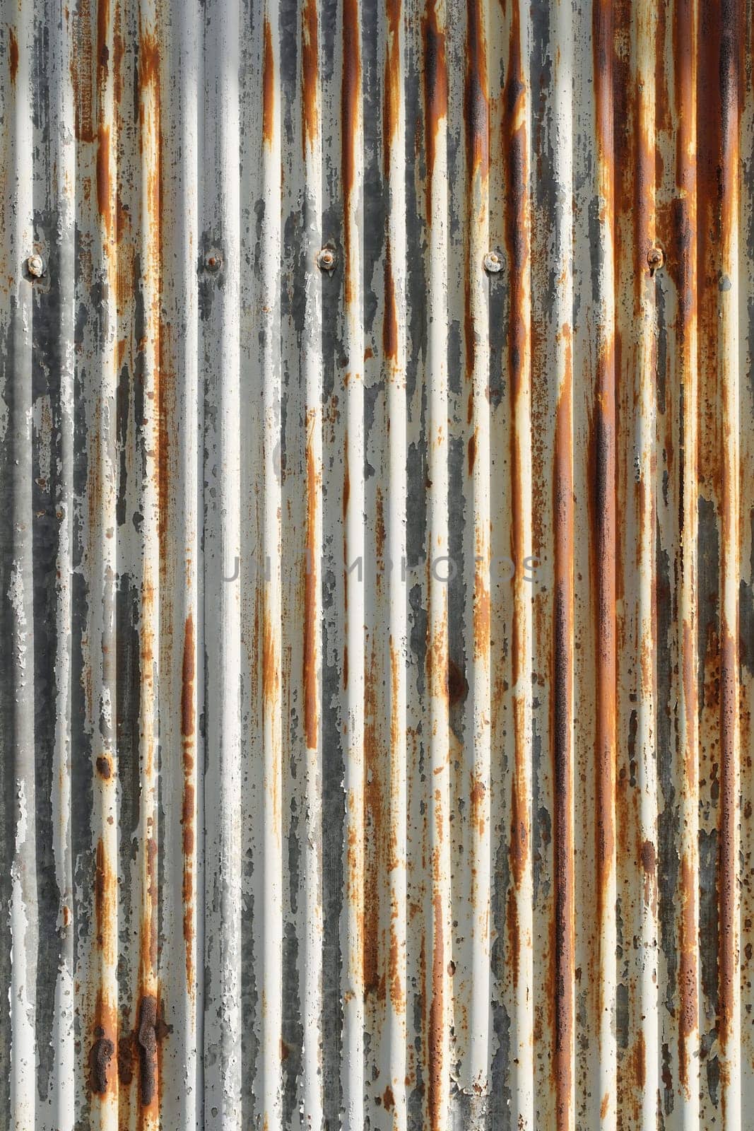 Artistic of old and rusty zinc sheet wall. Vintage style metal sheet texture.