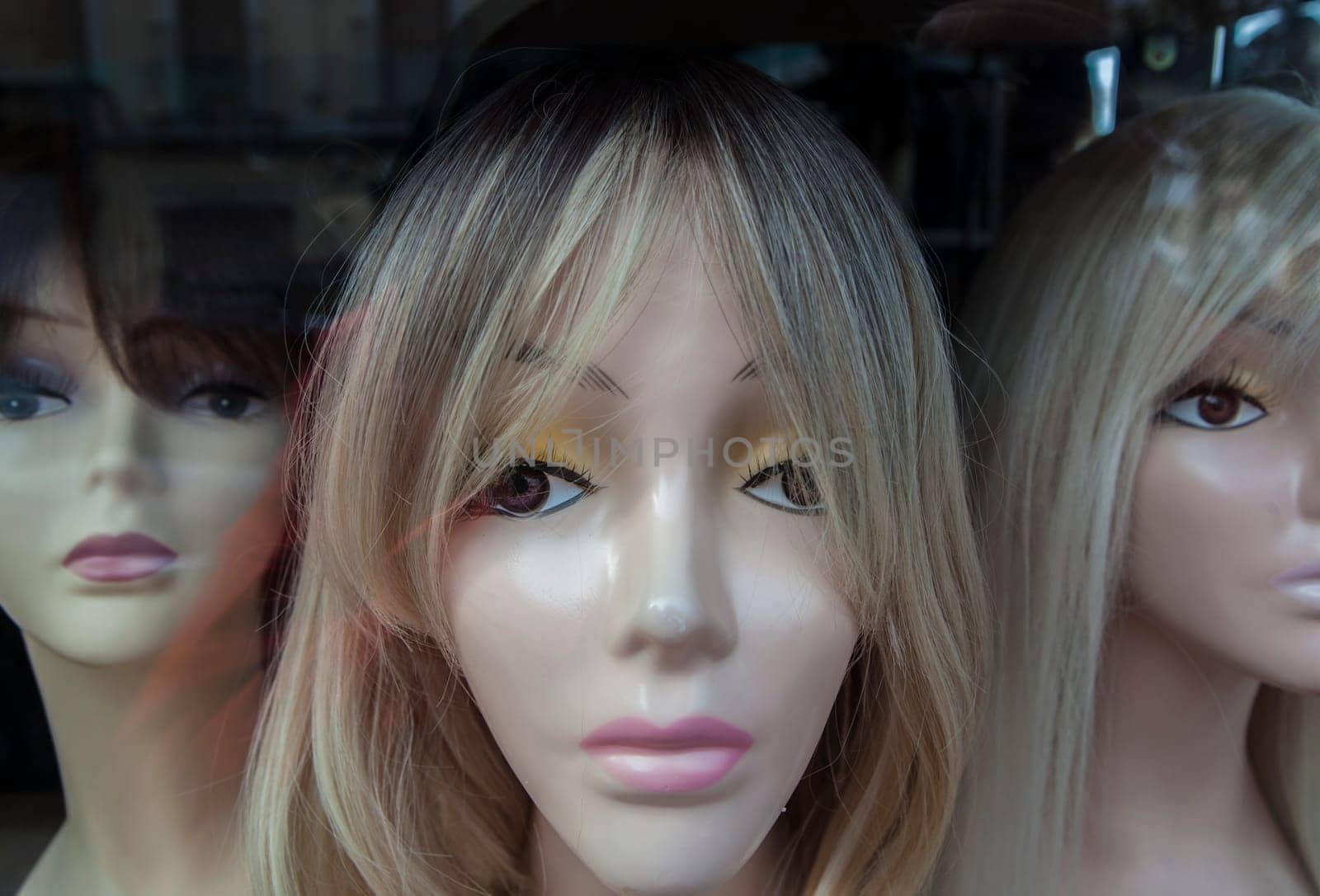 Wigs shop mannequins display. Wigs increases the wearers self-confidence and self-esteem