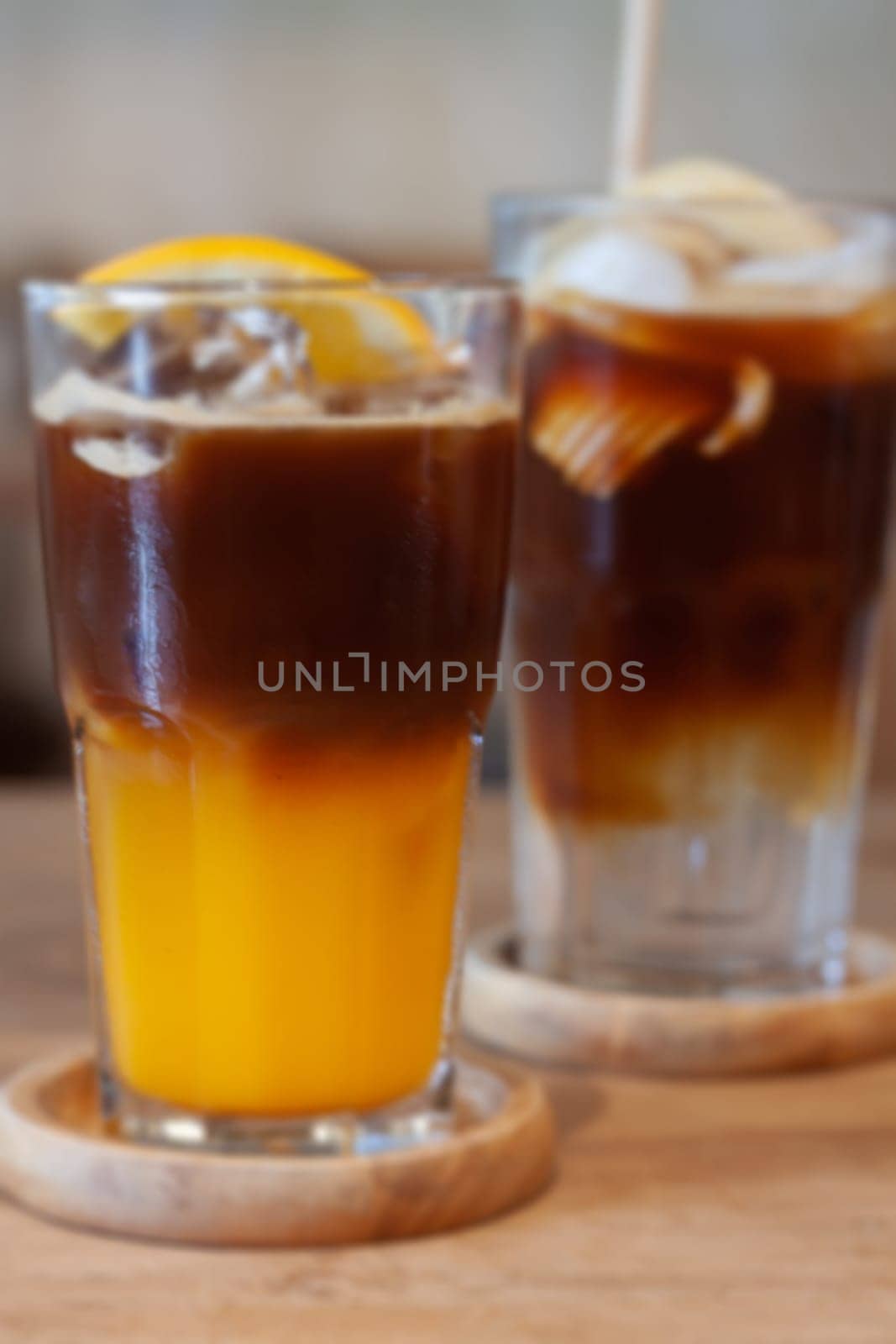 Glass of americano mixed with orange juice, stock photo