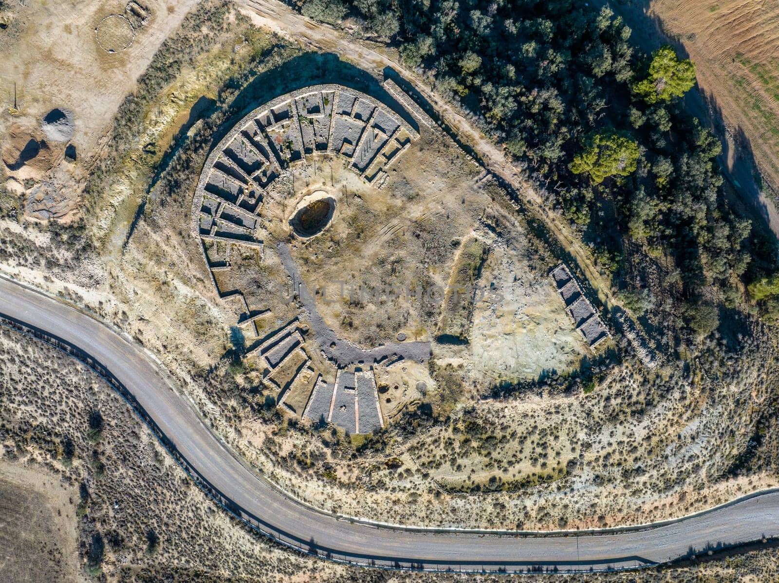 Iberian site of the Estinclells, 3rd century BC, in Verdu. Formed by defensive elements, a moat and a wall, a battery of houses and a raft arranged around a cobbled street. aerial view Cenit