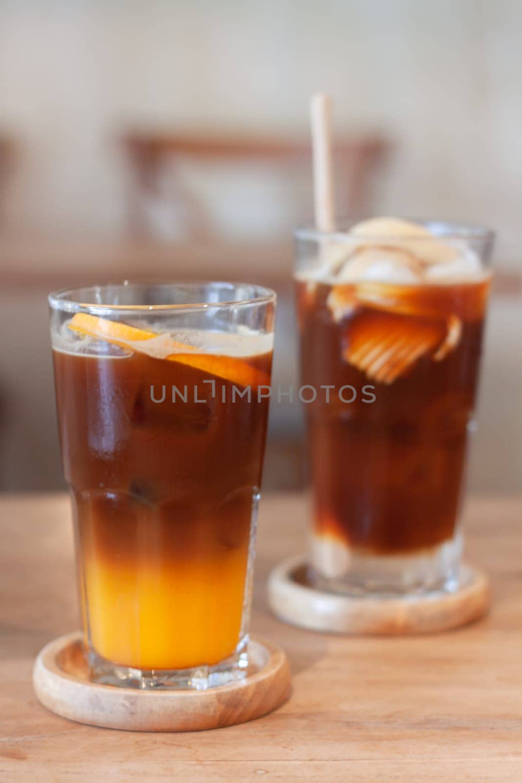 Glass of americano mixed with orange juice, stock photo