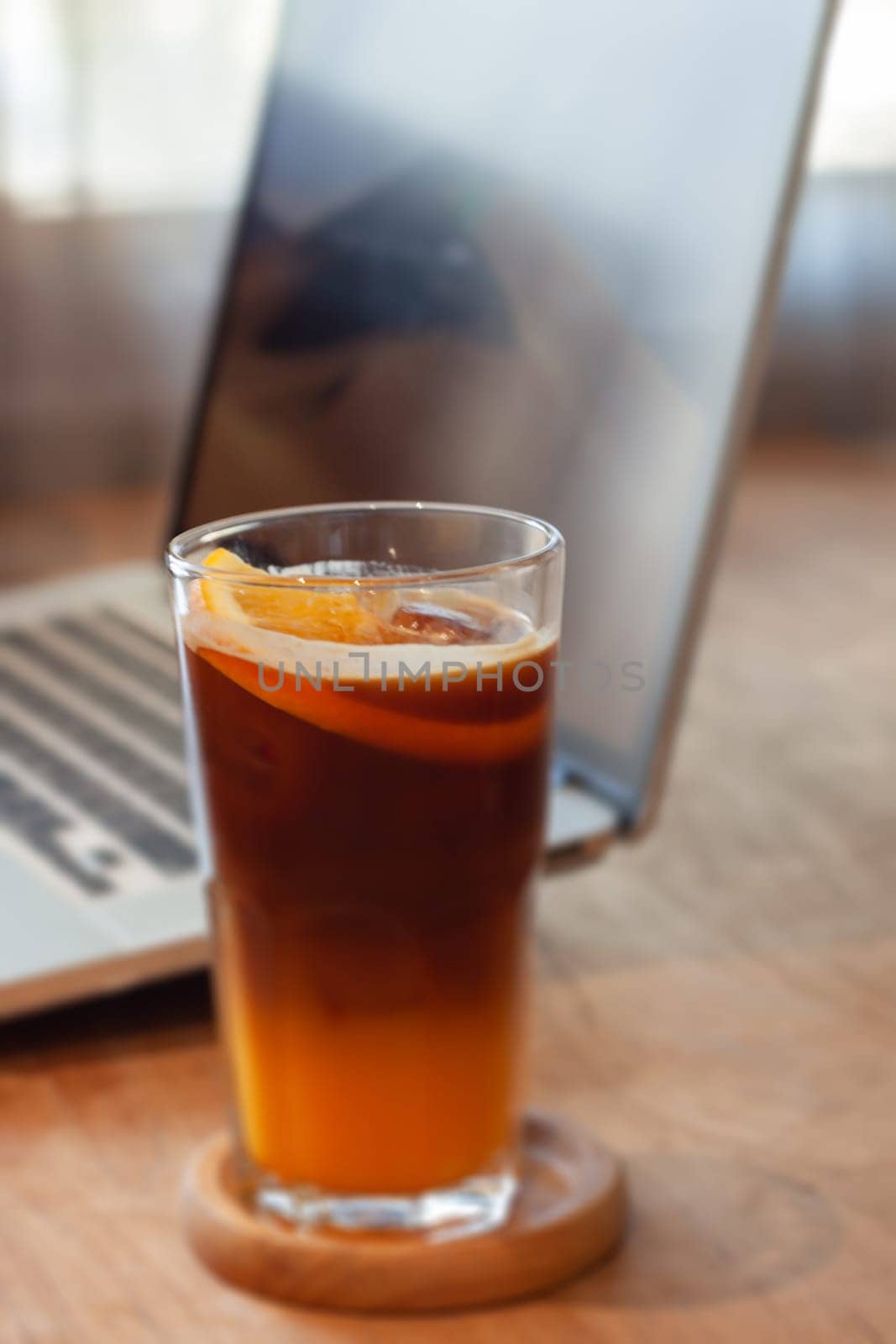 Glass of americano mixed with orange juice, stock photo