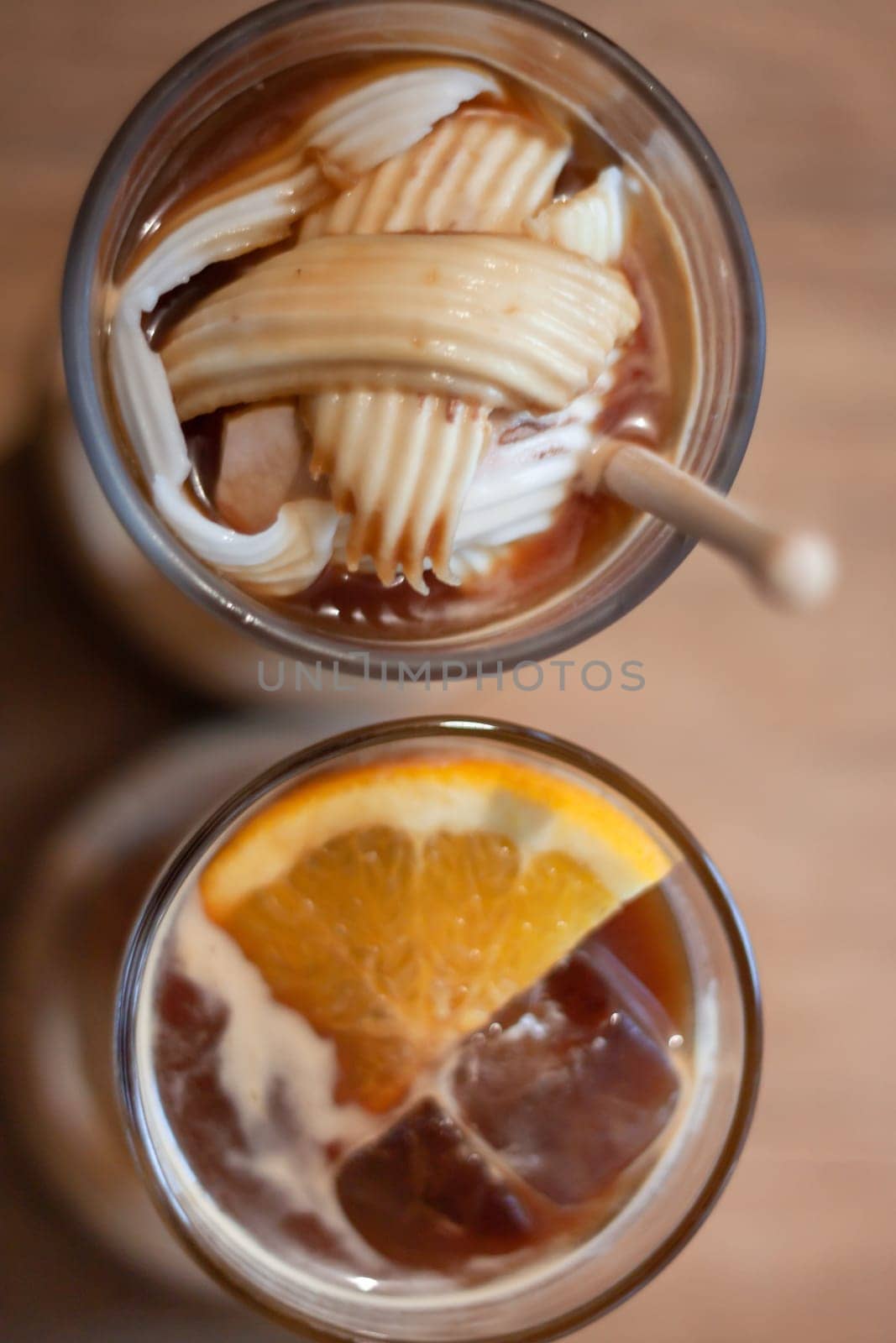Glass of americano mixed with coconut and orange juice, stock photo