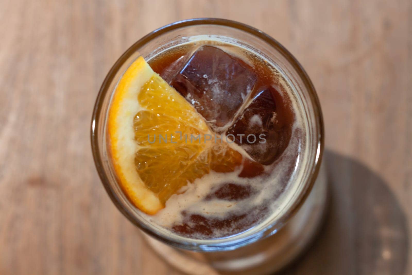 Glass of americano mixed with orange juice, stock photo