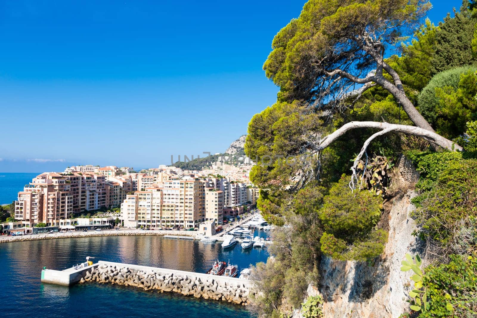 Montecarlo, Monaco - August 2022: panoramic view of the Fontvielle port with blue sky and sea