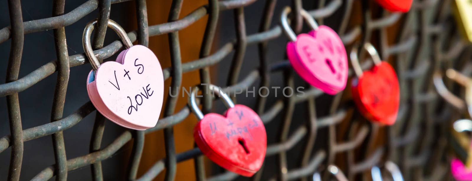 Verona, Italy - June 2022: love locks, concept for engagement, happiness, marriage and romantic relationship