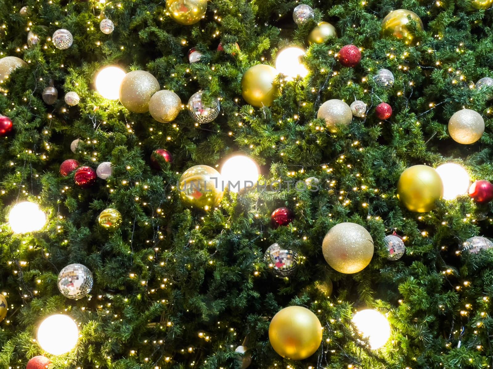 Christmas tree with light bulbs background, stock photo
