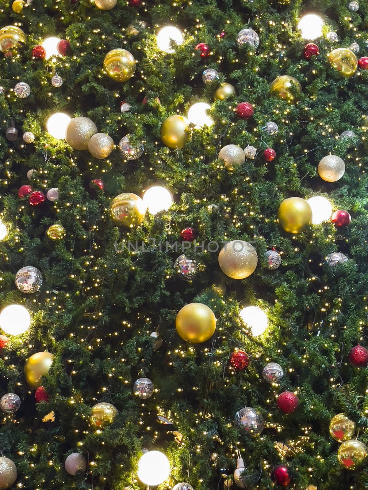 Christmas tree with light bulbs background, stock photo