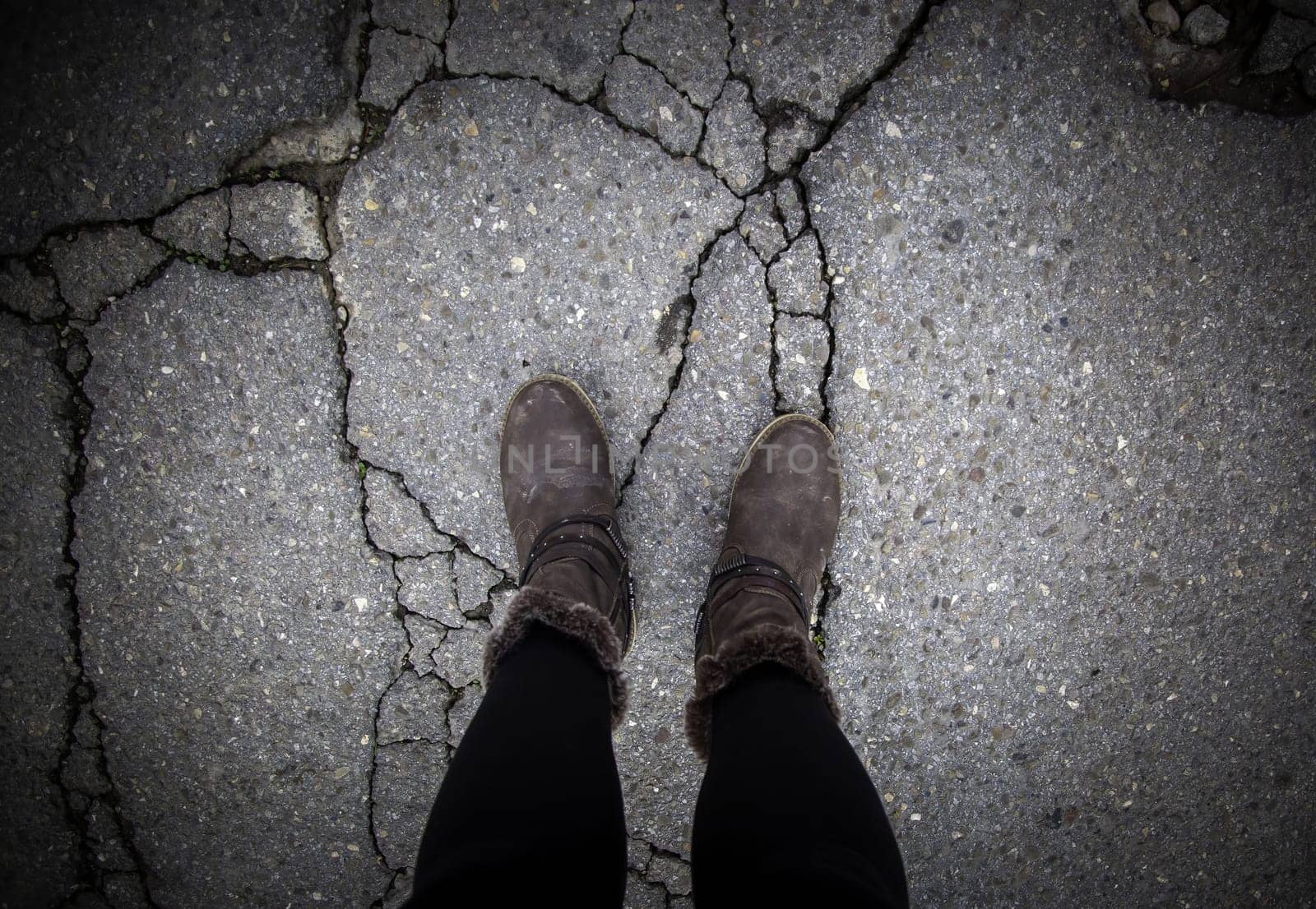 Detail of young man on a road