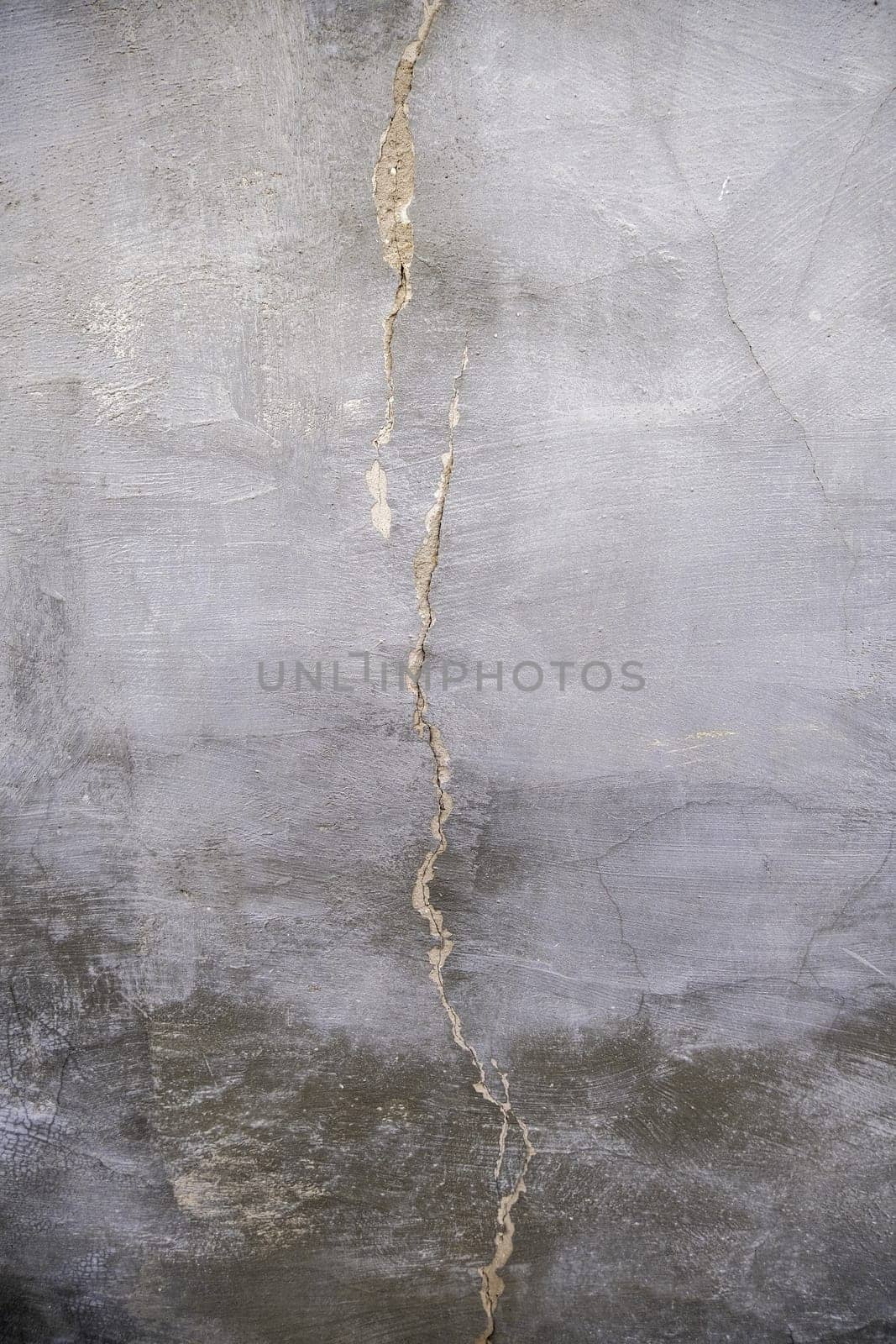 Detail of old ruined cement wall