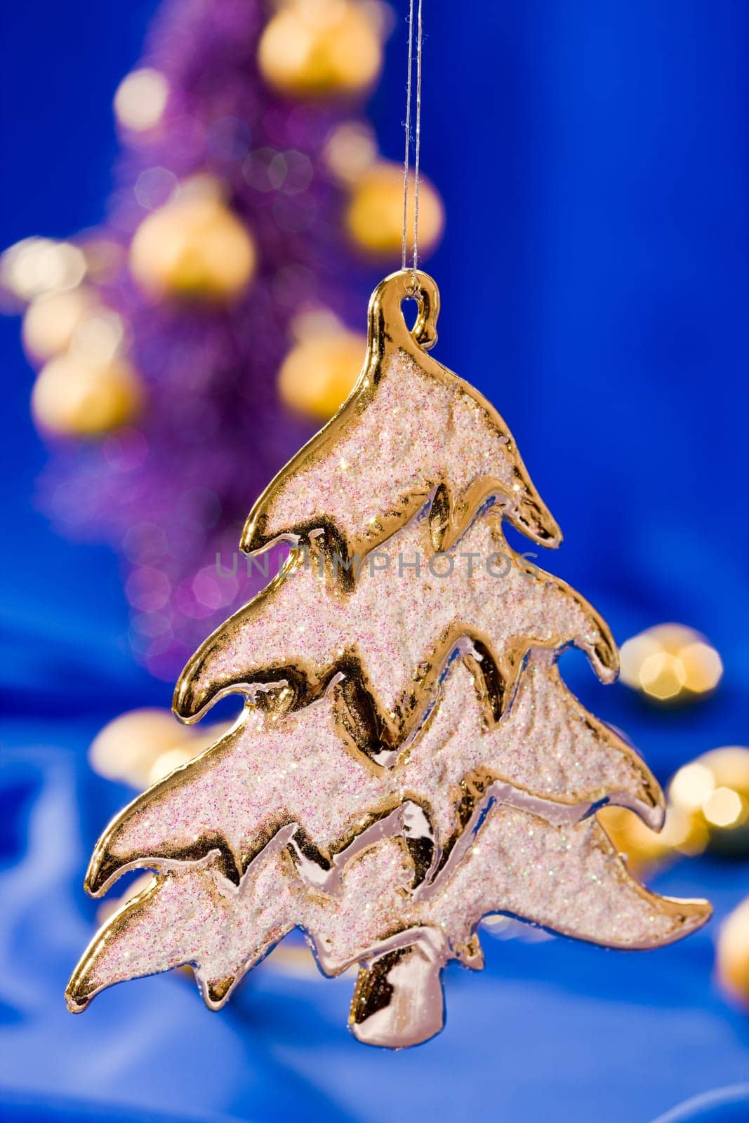 holiday series: golden Christmas fir with rich decorated  background