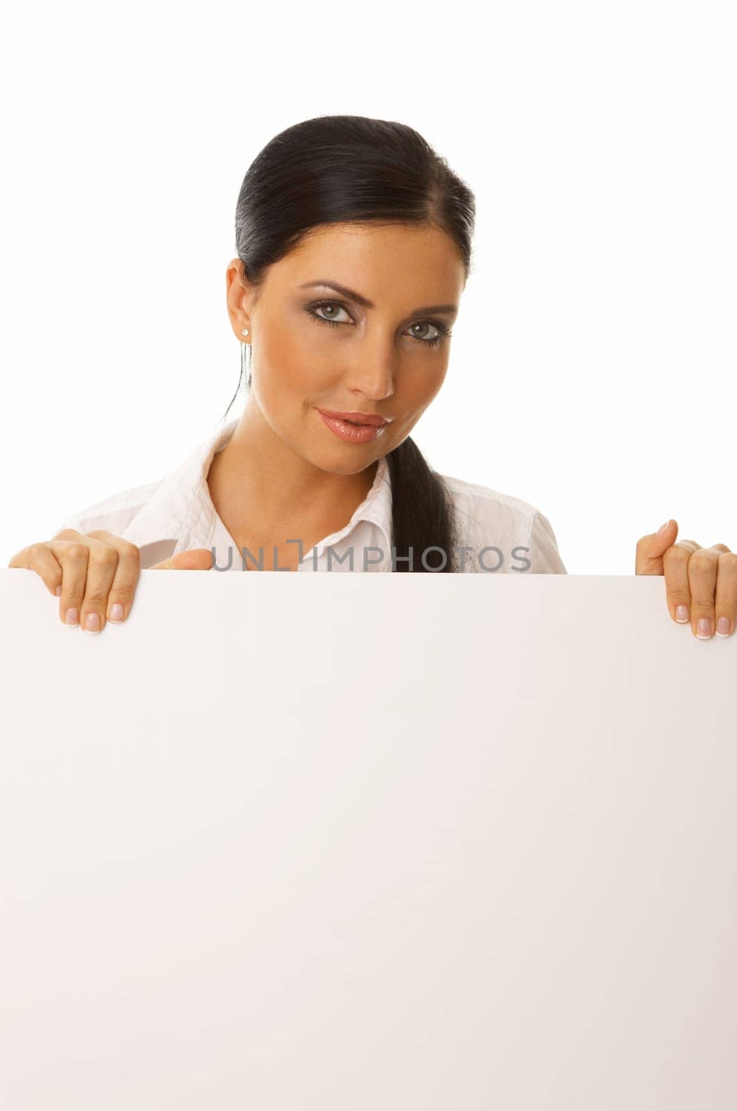 Beautiful business woman holding empty white board