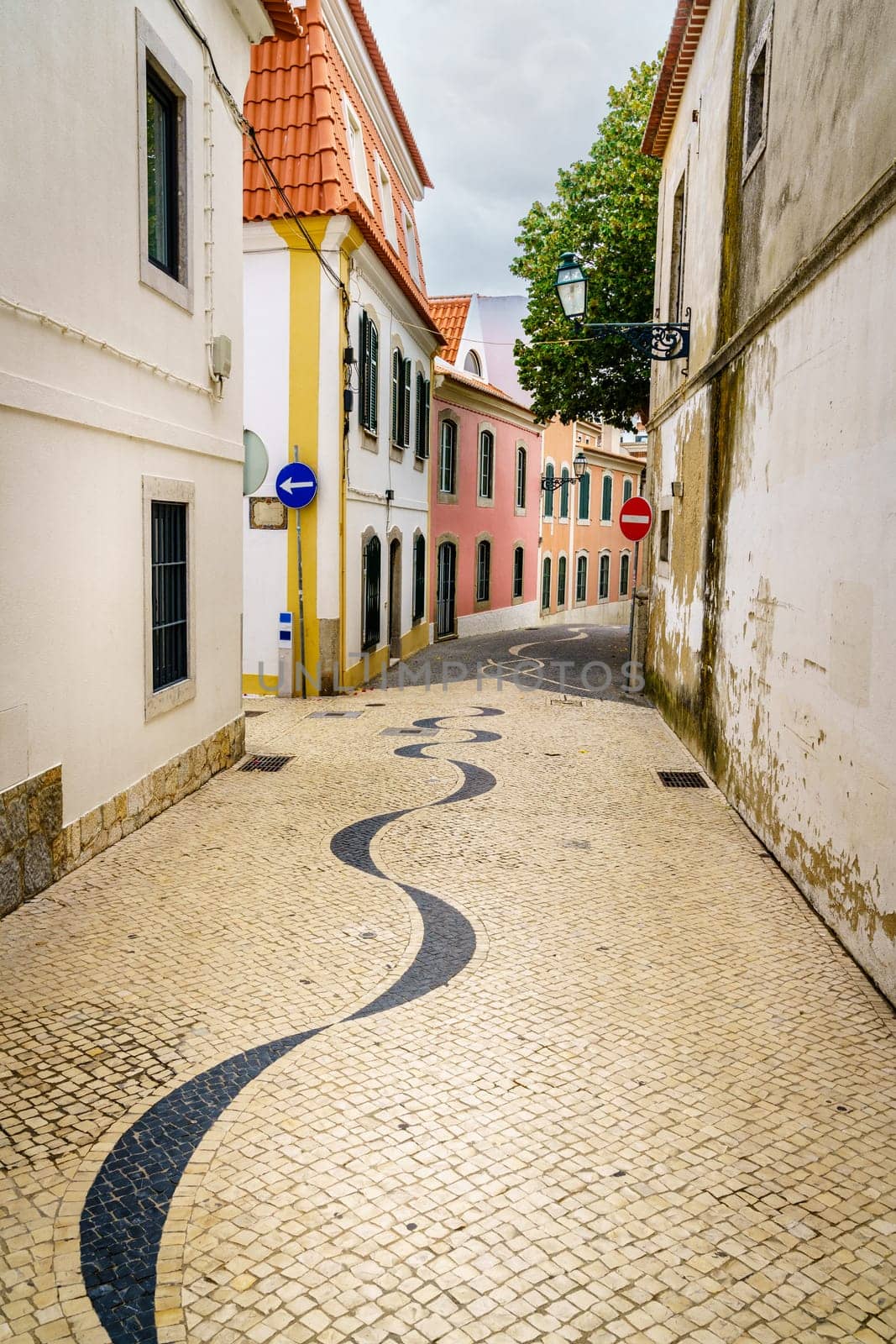 Pedestrian cobblestone street in Cascais, Portugal