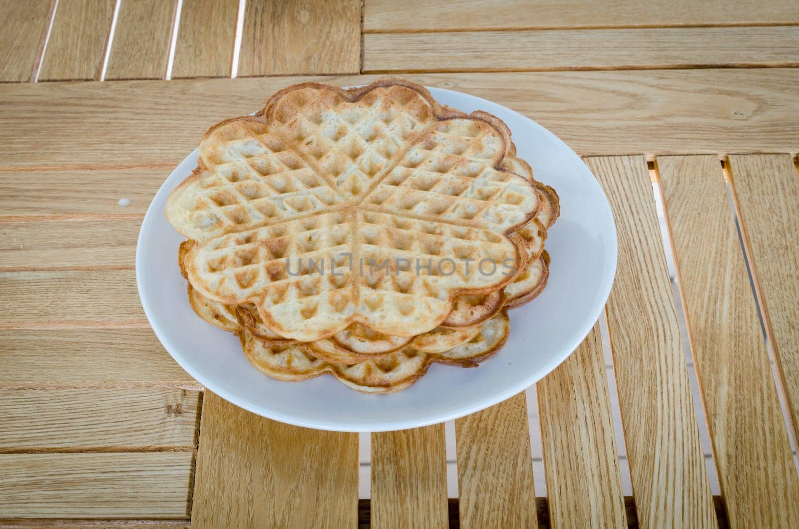 one plate with a couple of waffles