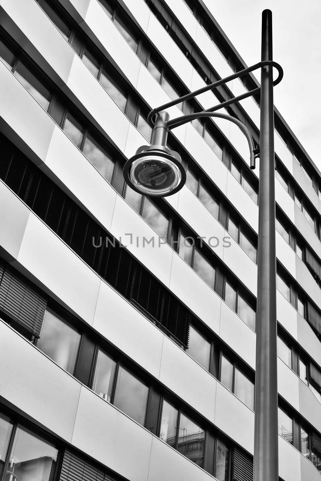 Office building in the city centre of Berlin with street lamp