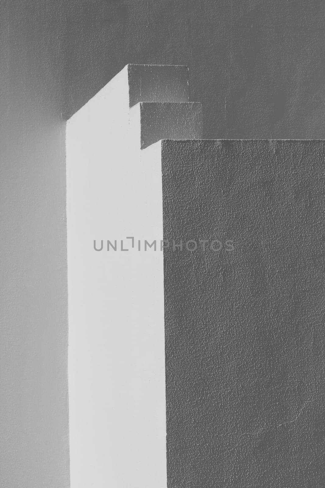 The small part of the white facade of the building in Egypt. side view