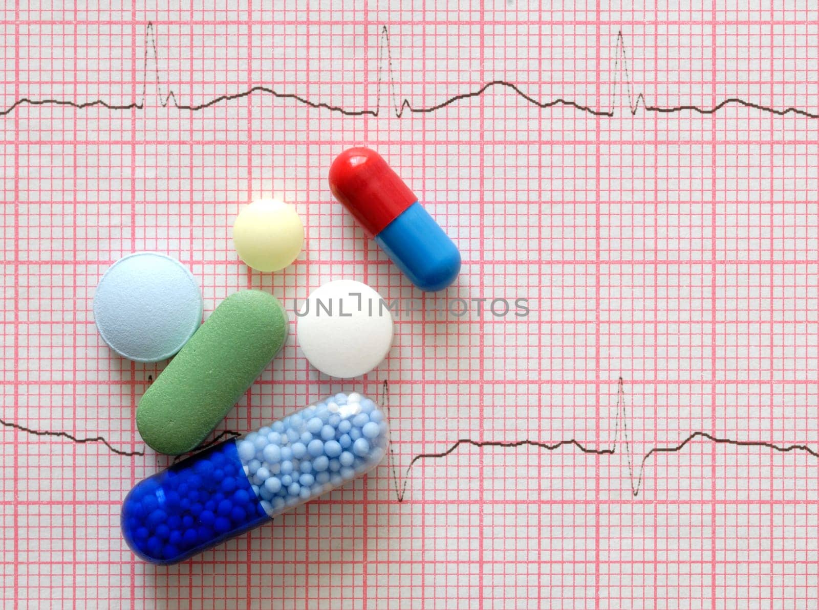 Macro of pills lying on ECG diagram