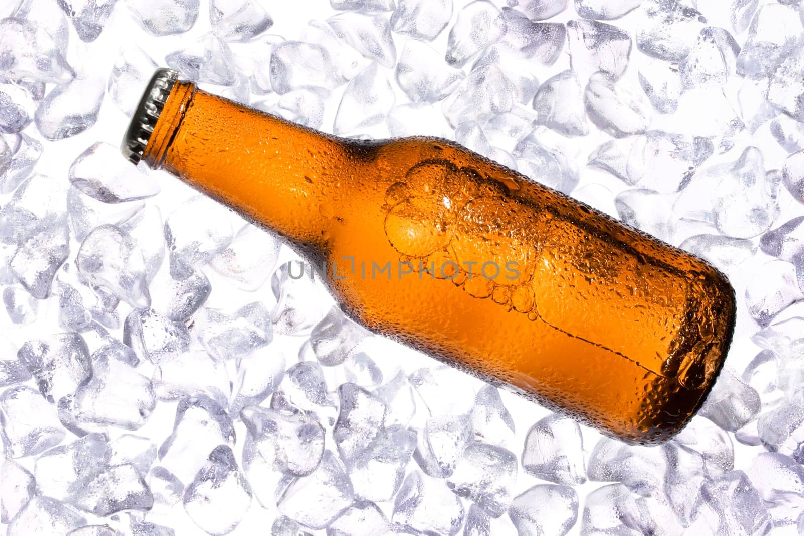 Fresh beer on background with cold ices.